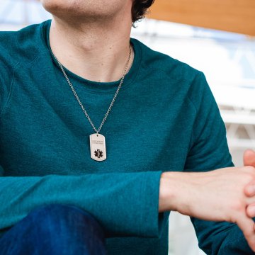 titanium dog tag medical id necklace with titanium bead chain, black medical emblem design on pendant, lightweight, durable design, and hypoallergenic 